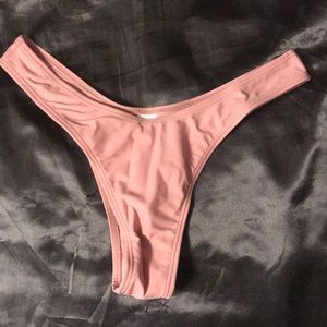 NWOT. Thong bathing suit bottom. Never worn